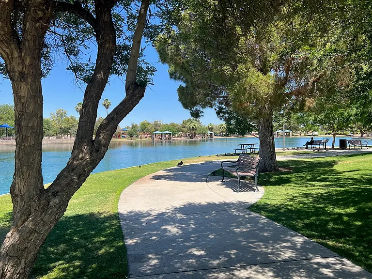Desert Breeze Park is 1.5 miles away with athletic fields, playgrounds, water pad and weekend/seasonal park railroad rides, police and fire station.