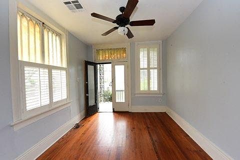 View is of the front door from inside the unit.