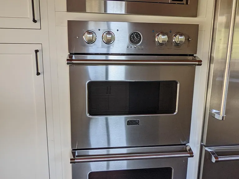 Viking Electric Double Ovens + Microwave that also is a an oven.