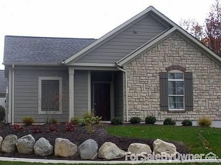 Exterior of Home : Hardie Plank siding exterior and stone cathedral