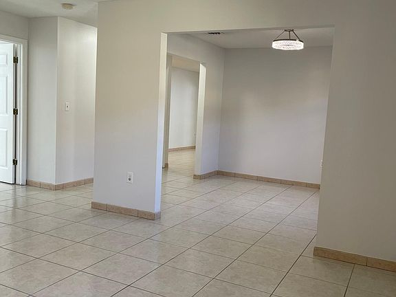 Living room than a separate dining room area. All freshly painted .