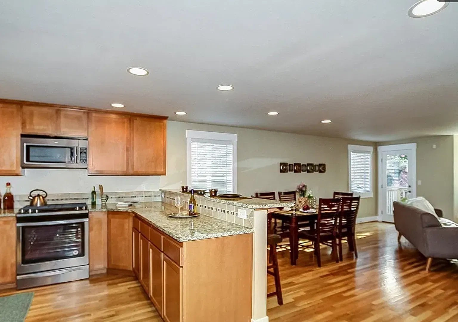 Updated Central District Townhouse with Attached Garage & Private Yard! — Photo 2