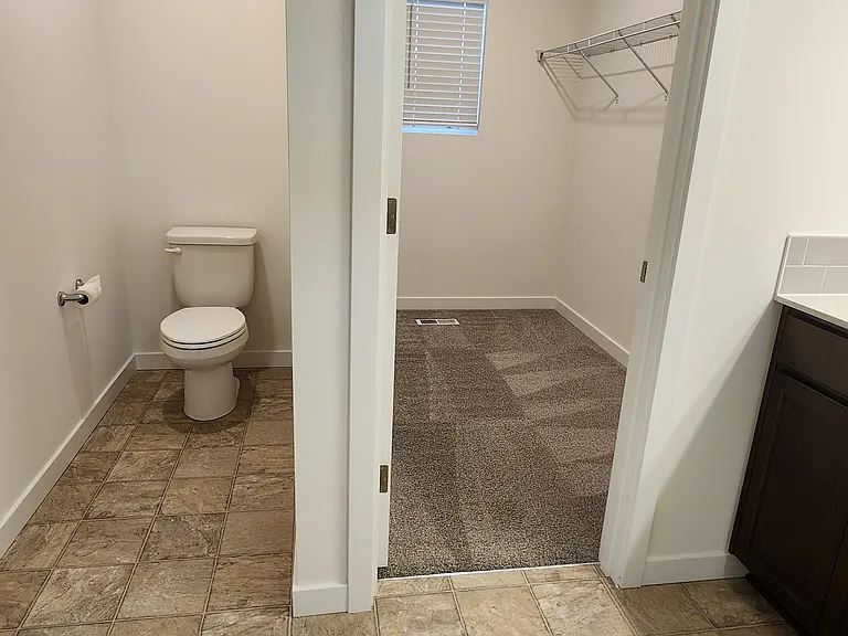 Master toilet with walk-in closet.