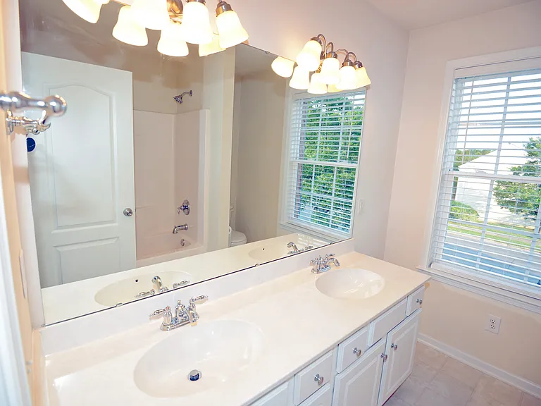 Upstairs hallway bath view 1, tub / shower comb.