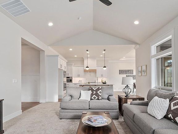 Open concept keeps you connected whether you're you're in the living room, kitchen, or dining area!