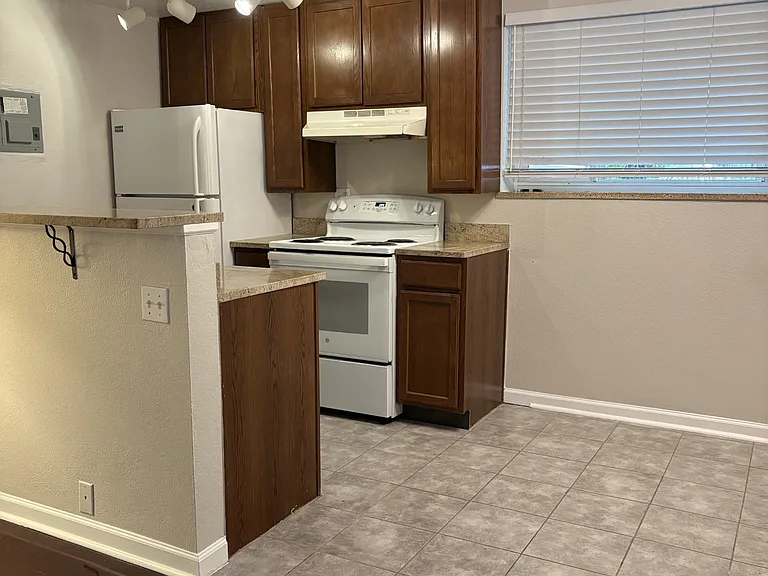 Kitchen dining area - newly pained, unfurnished.