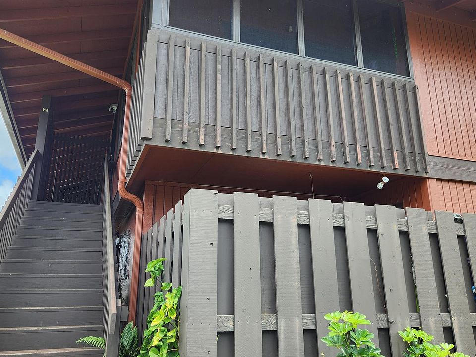 Upstairs Unit with an enclosed lanai.