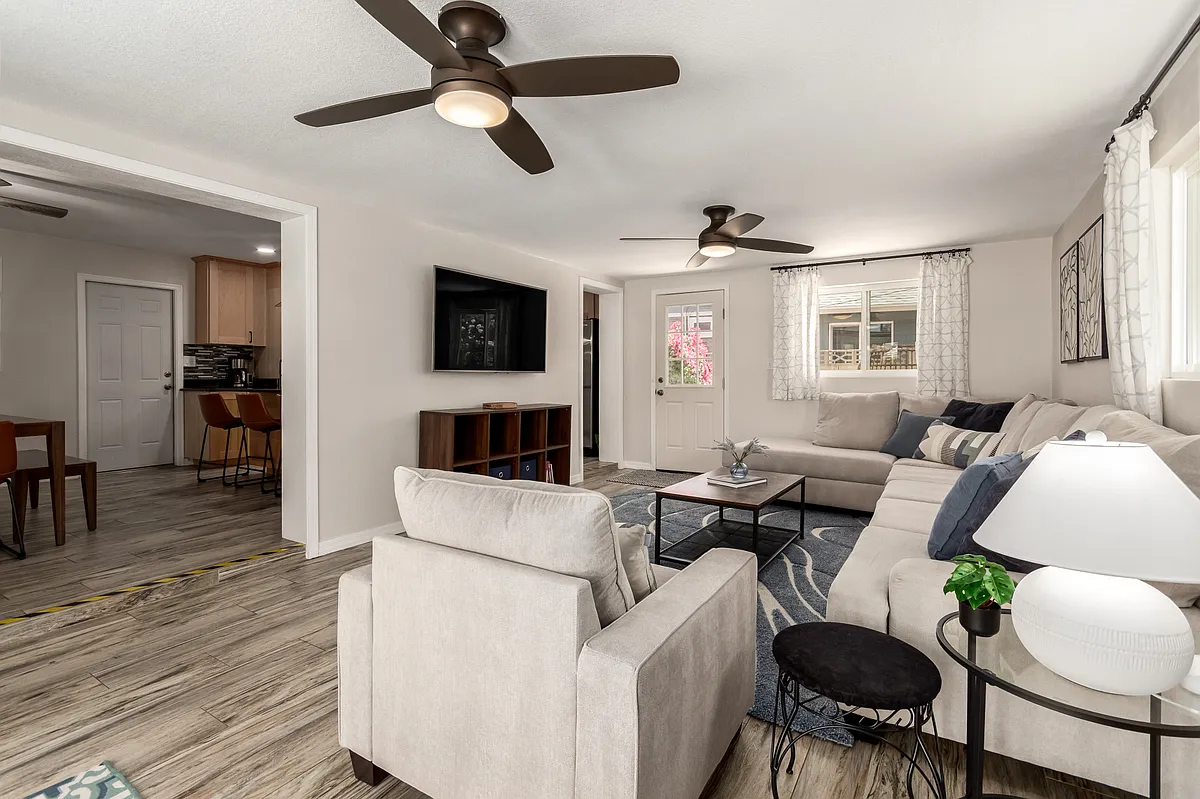 2nd Living Room with comfy sectional, Smart TV, books, games and plenty of natural light! - E Hubbell St