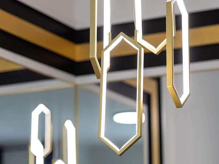 Luxury chandelier light fixture above Dinning table.