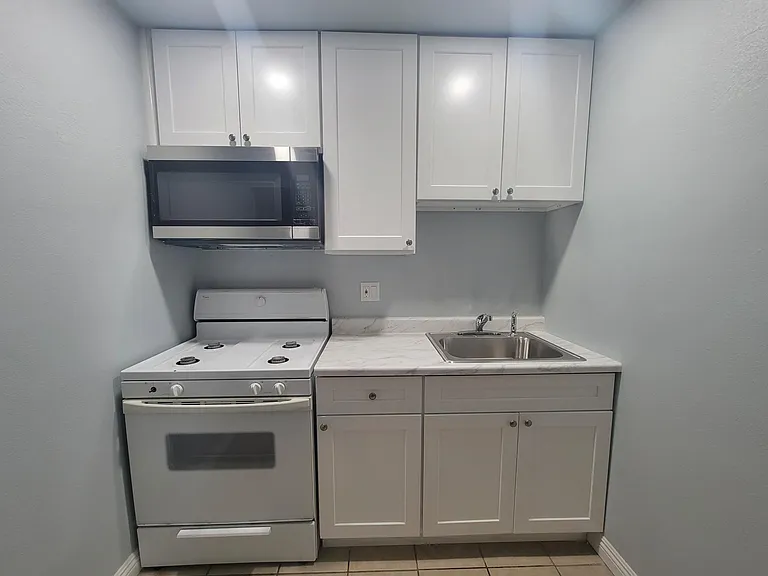 kitchen new cabinets and microwave