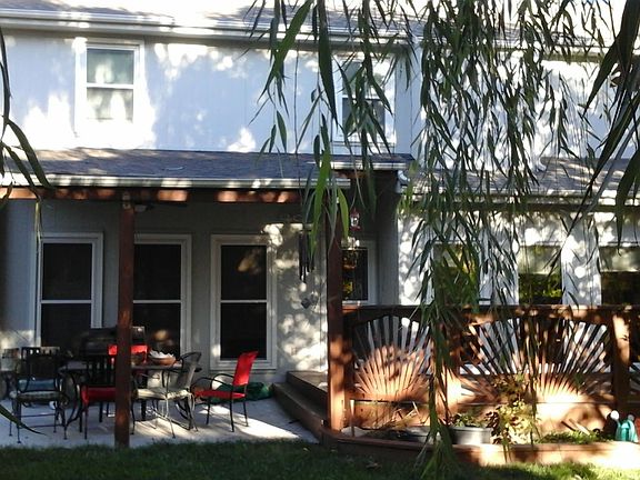 Covered patio and deck with trees