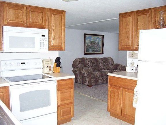 Kitchen opens to living room