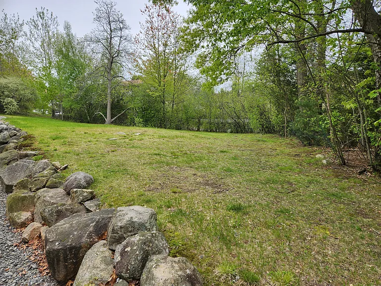 The complex has a picnic area next to the pond