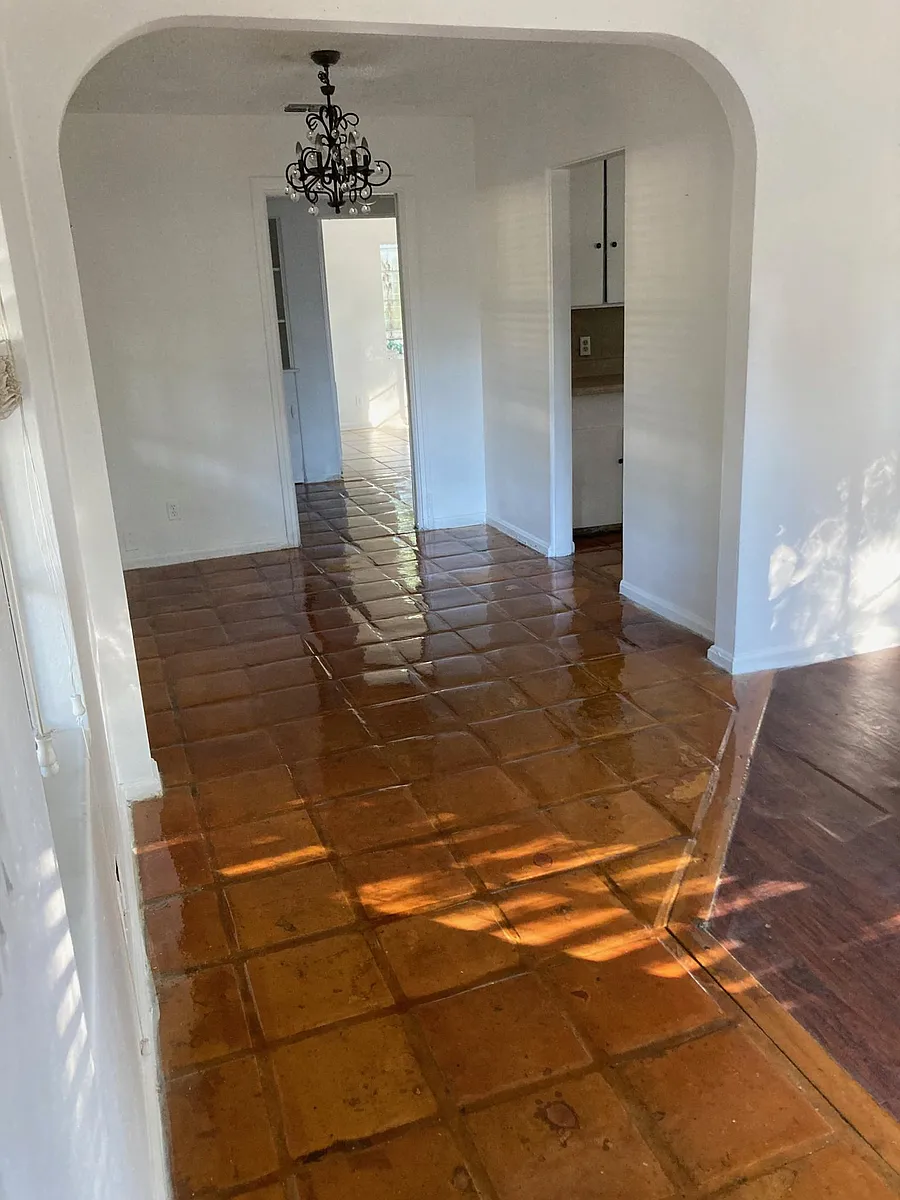 Looking from front door past dining area to bedrooms. - Windermere Dr