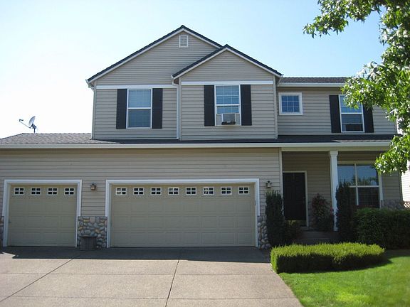 3 Car garage with lots of overhead storage