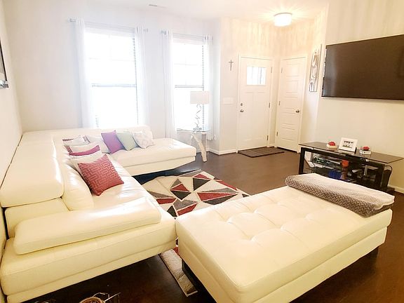 Entrance, living room and coat closet