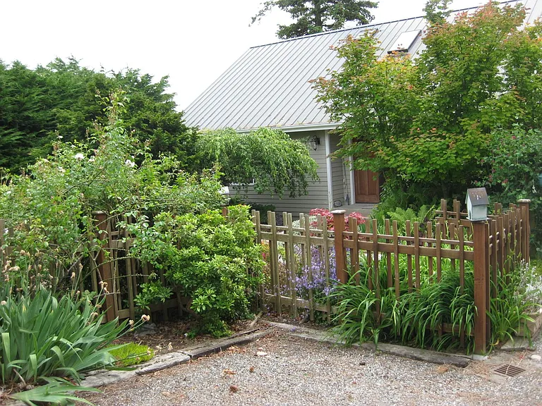 Extra parking in front - fenced yard.