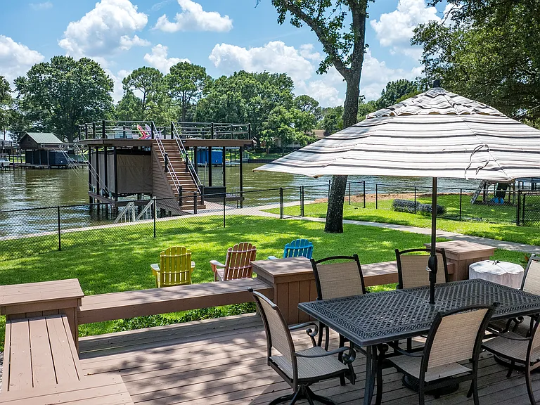 Deck #1 - outdoor table with seating for 6 and an umbrella - plenty of other seating.