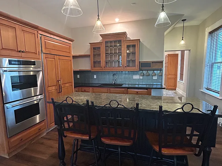 Custom island with thermador gas range. A cook's dream!