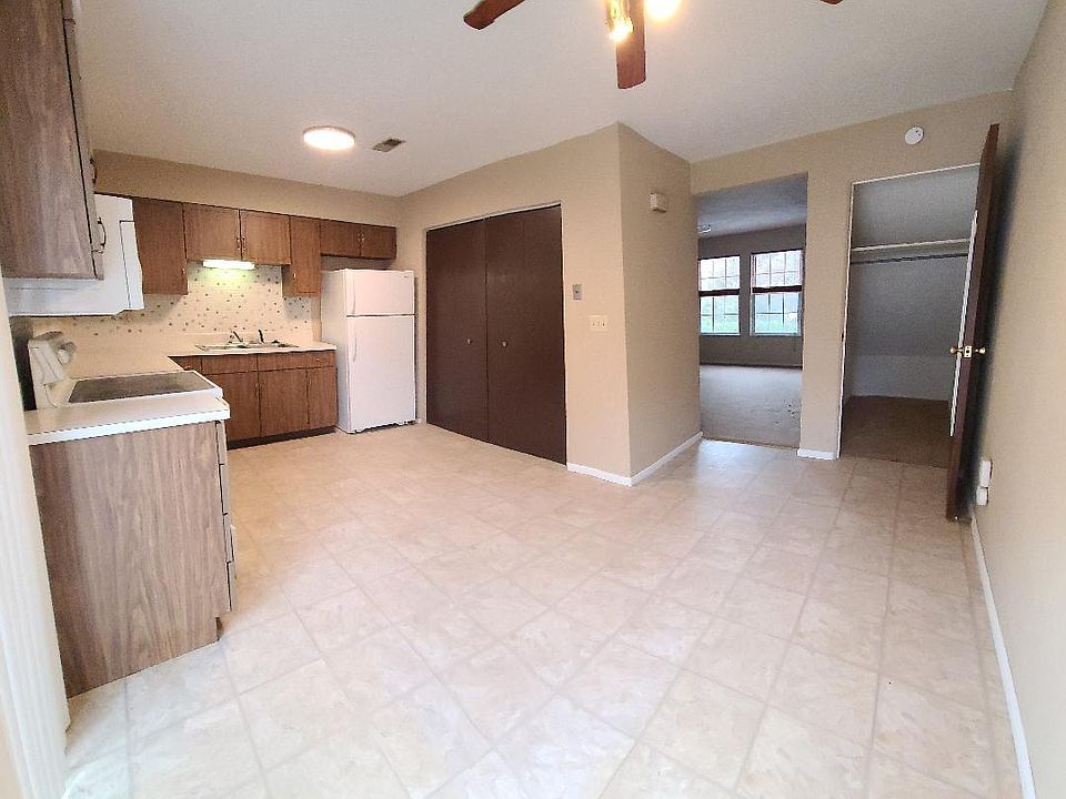 Kitchen with eat-in dining and under stairs storage
