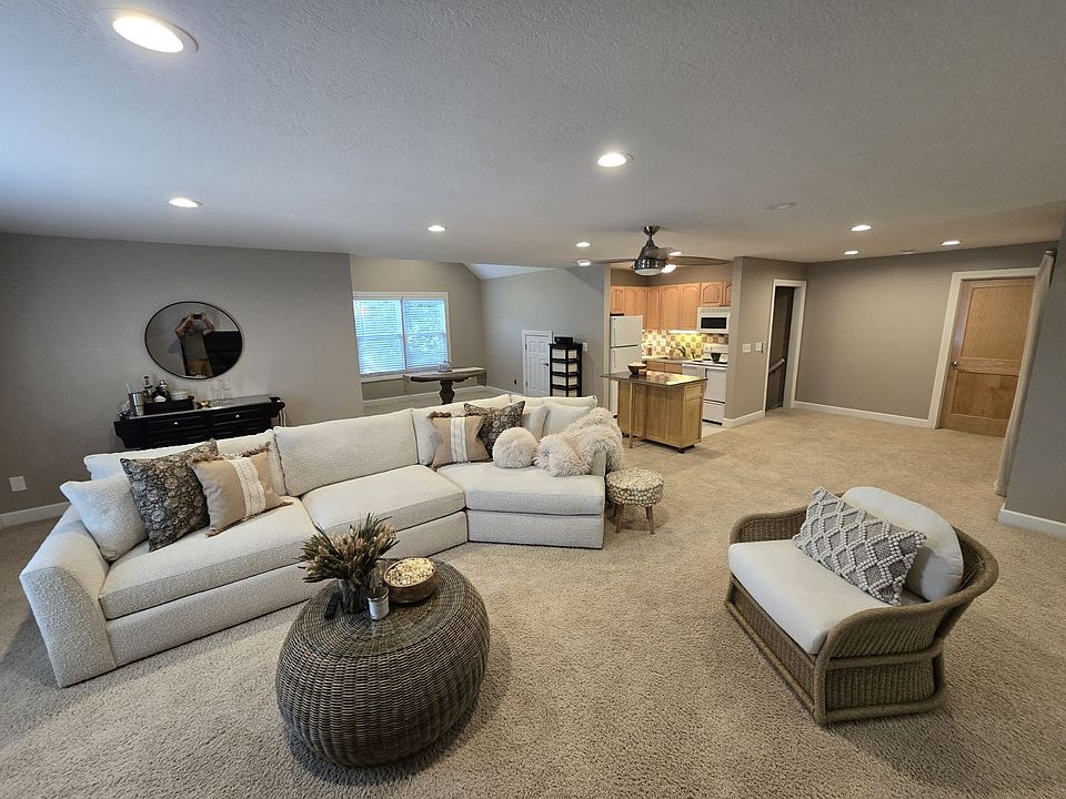 View of Great room and kitchenette with island. Brand new furniture from Arhaus.