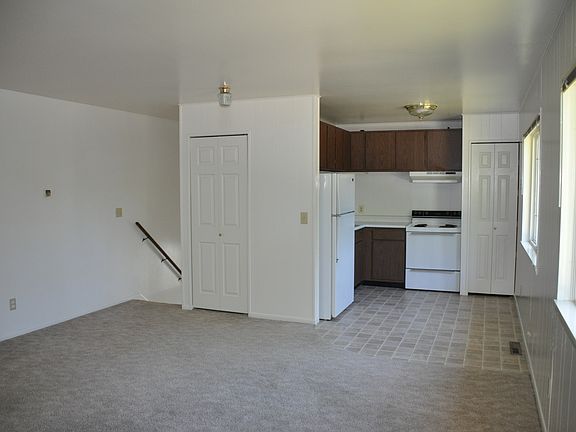 Living room, dining, and kitchen