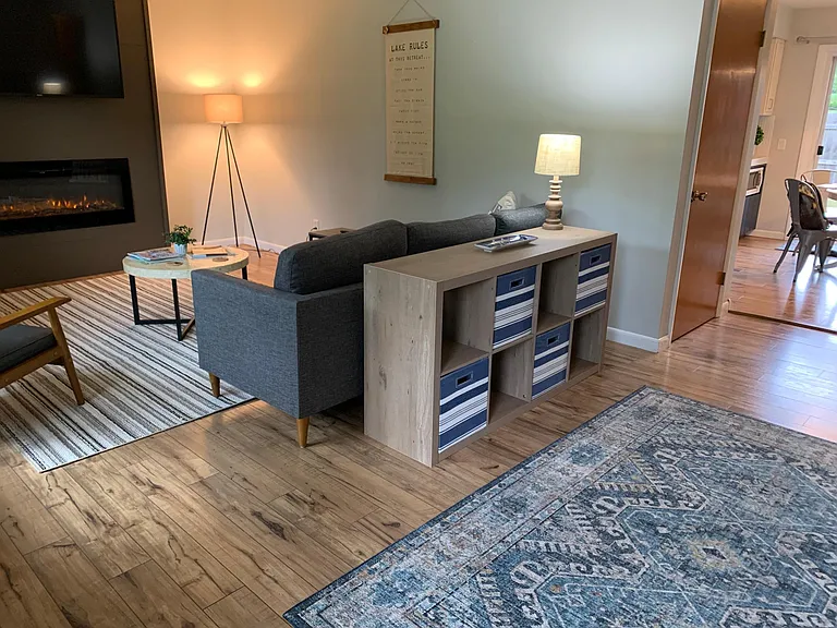 Entry way & living room with view into dining room