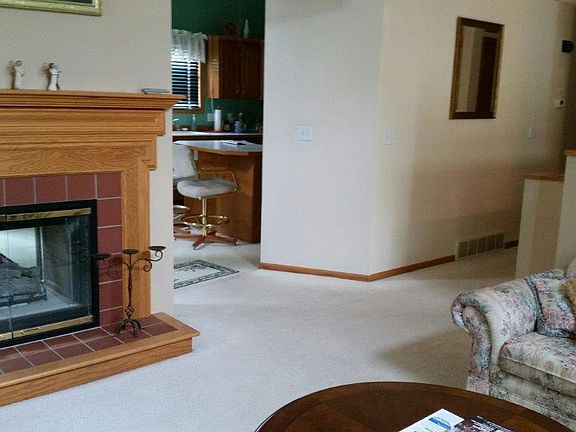 LR to fireplace and kitchen