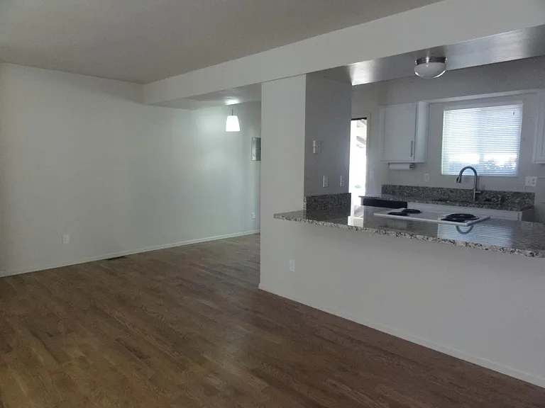 Open concept kitchen, living & dining area