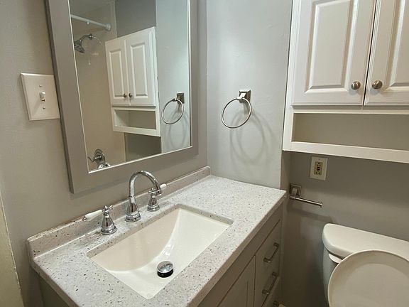 New carerra marble inspired floors and new vanity ans fixtures