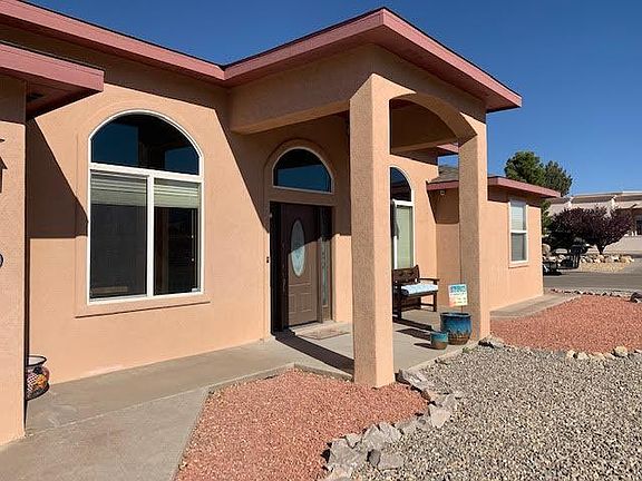 Rock landscaping and corner lot. (Back yard has covered patio and RV gate)