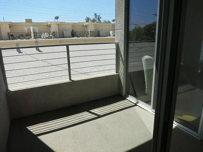 balcony off living room & bedrooms
