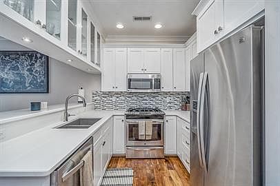 2nd image of 9428 26th Bay St Floor 1
