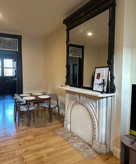 Marble fireplace & dining area.