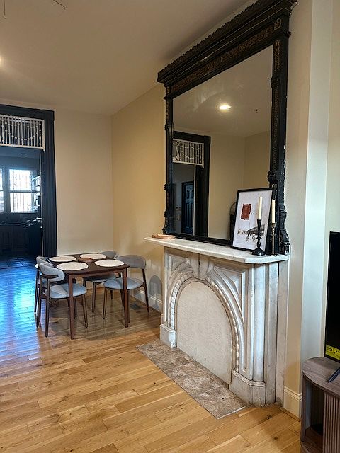 Marble fireplace & dining area.
