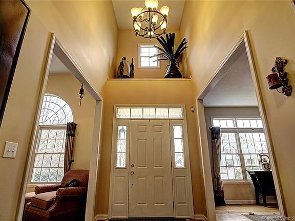 Two story foyer welcomes you into this sun-filled colonial!