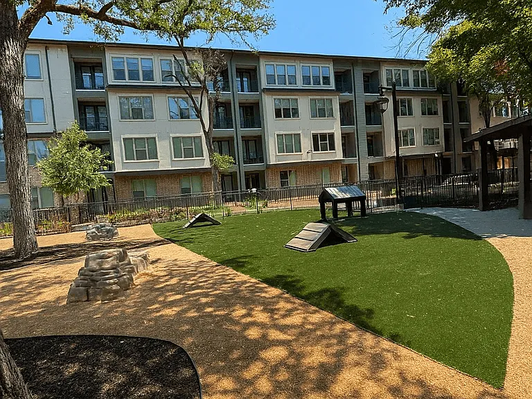 Sunny Dog Park with Apartment Views