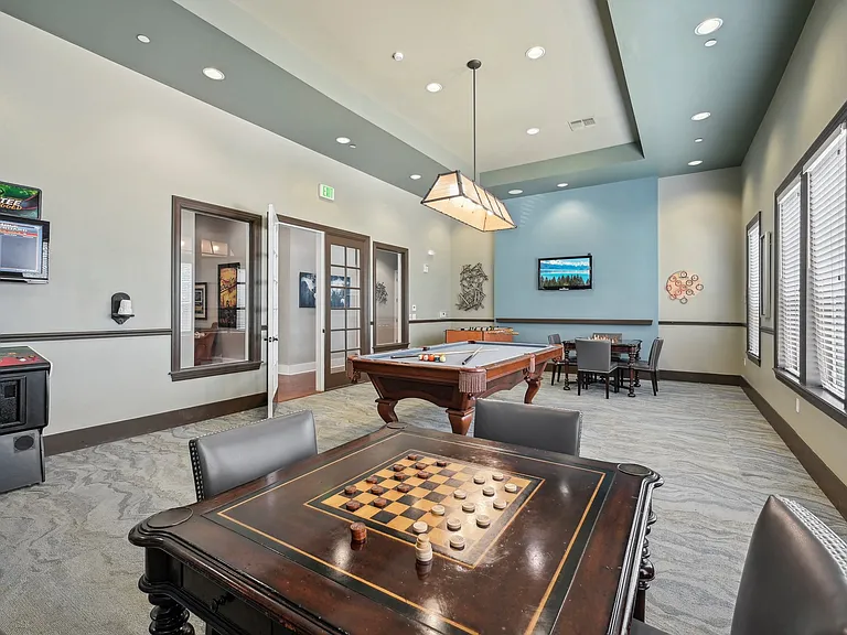 Arcade Game Room with Billiards and Foosball