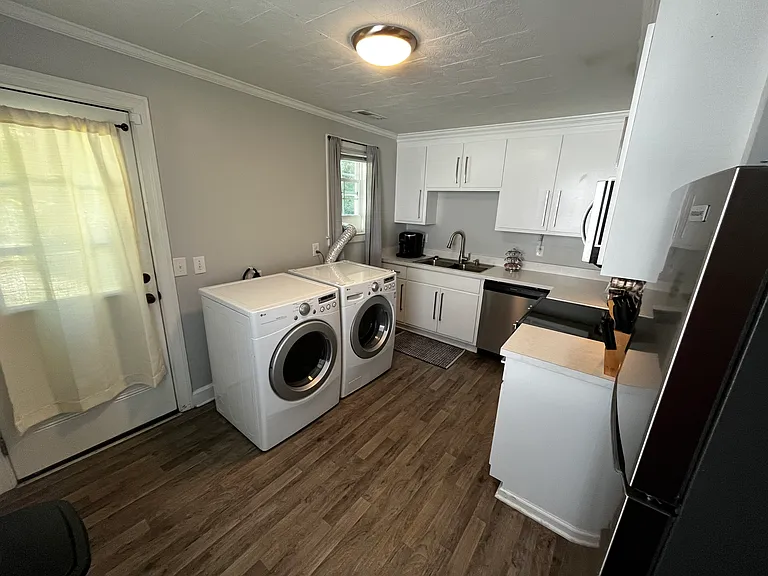 Kitchen with washer dryer