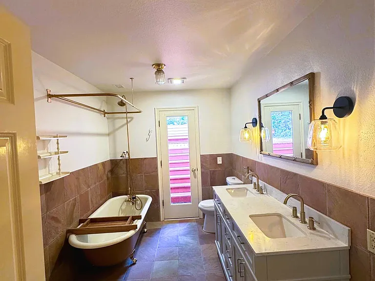 Main level bathroom with clawfoot tub
