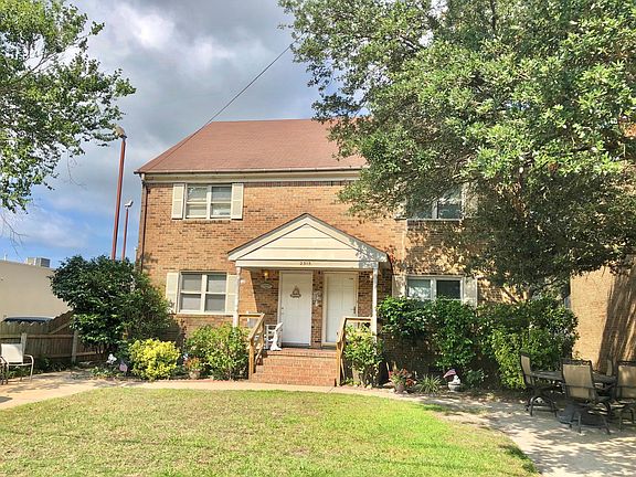 Brick Duplex. I live on the left side, you will be renting _The Beach House_ on the left side.