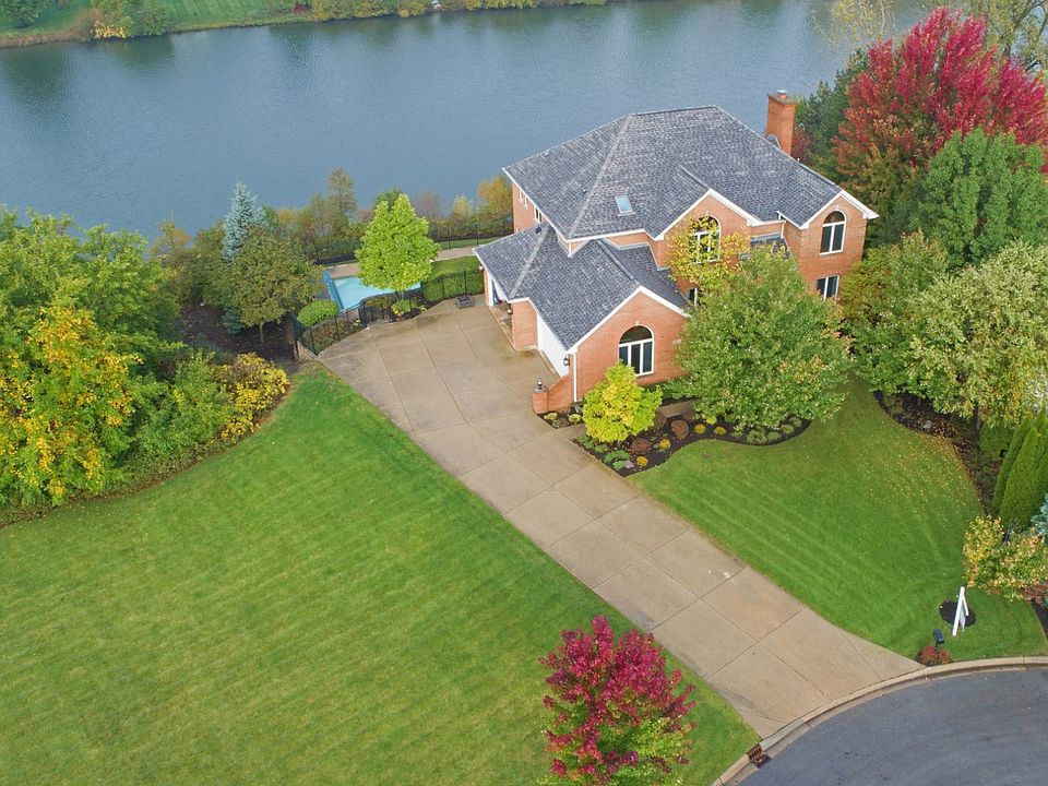Double lot makes this property .64 acres large!  Home on cul-de-sac on fully stocked fishing/canoeing POND in Wedgewood