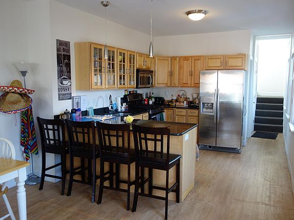 Open concept kitchen/dining area.