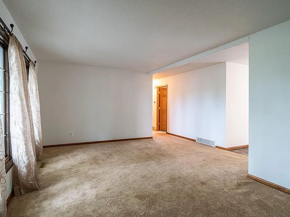 Living Room overlooking hallway to bedrooms