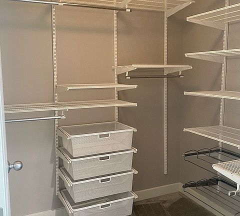 Walk-in closet with plenty of space/storage.
