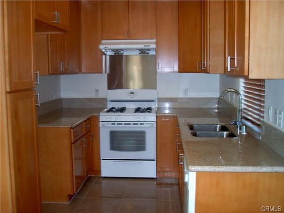 Kitchen with granite counter top. 