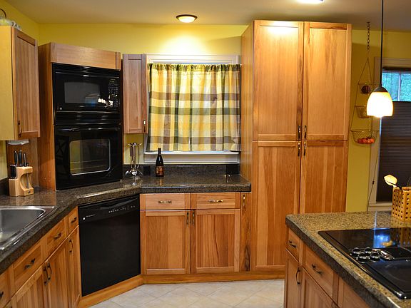 Hickory cabinets w/ granite tile countertops