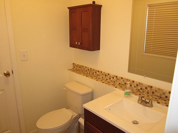 Half bath off master bedroom.