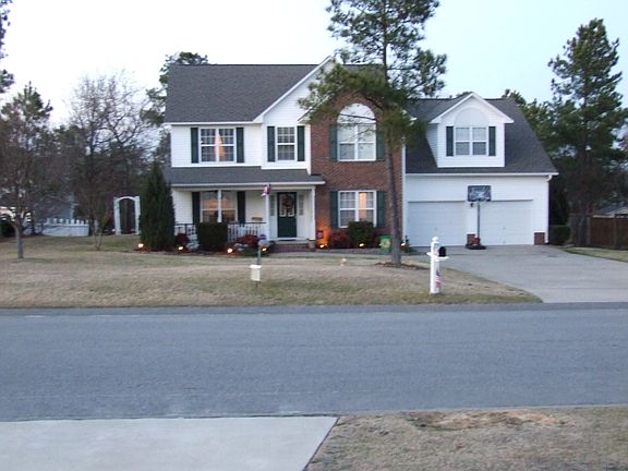 Large level lot, brick face