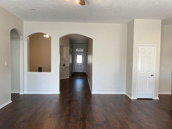 Family room, dining room and front hallway.